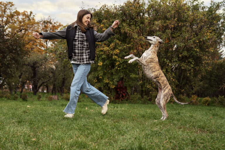 full-shot-woman-dog-running-outdoors